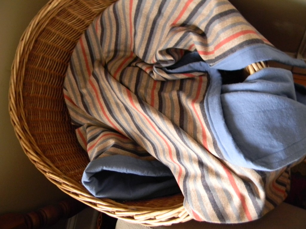 stripy blanket in basket
