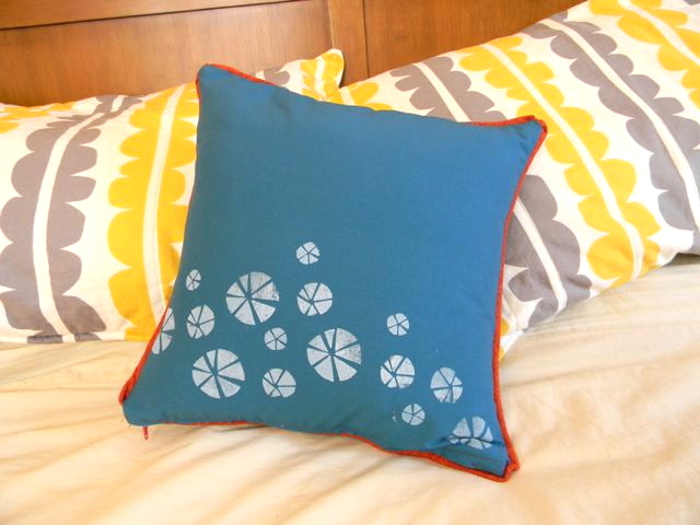 hand stamped pillow in action